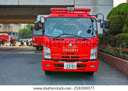 KOTO, TOKYO - JUNE 4, 2014:	Fire Engine of the Tokyo Fire Department. They provides fire protection to the capital area of Japan.