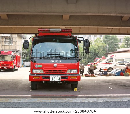 KOTO, TOKYO - JUNE 4, 2014:	Fire Engine of the Tokyo Fire Department. They provides fire protection to the capital area of Japan.