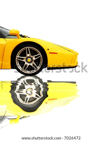 stock photo Yellow Ferrari Enzo super car reflecting in water