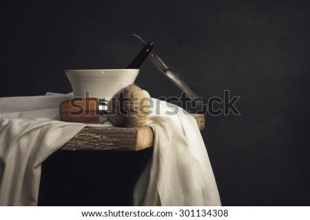 vintage Shaving Tool on wooden Table and dark Background