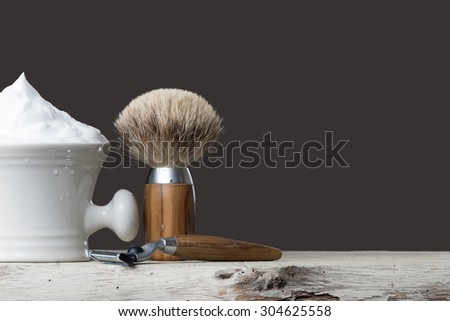 vintage Shaving Tool on wooden Table and gray Background