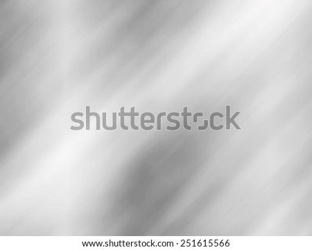 Metal background or texture of brushed steel plate with reflections and shine