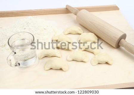 Dumplings on a pastry board