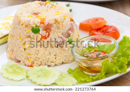 colorful fired rice on white plate