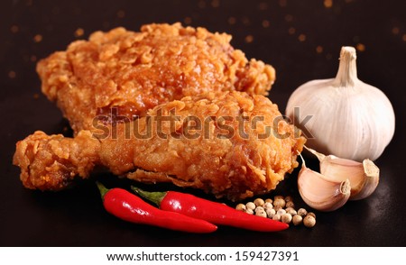 Hot and crispy fried chicken, chili, garlic and black pepper
