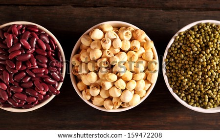 Lotus seeds, Red beans and green beans in white bowl on table