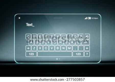 White color keyboard on transparent digital tablet. The most promising technologies in the mobile market is flexible and transparent displays.