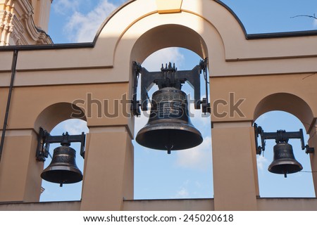 Church bells are hung high on the church tower