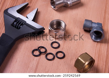 Professional plumbing tools and seals placed in the workplace.