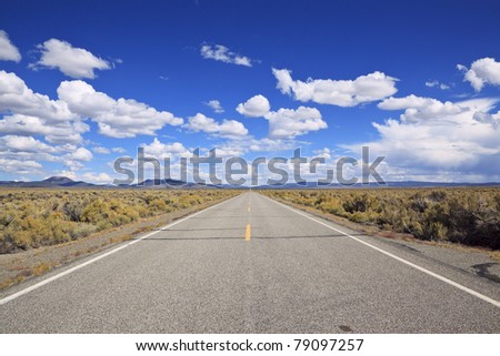 Desert highway to the horizon in eastern California