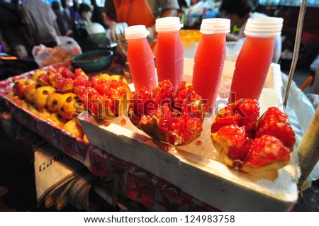 pomegranate juice and Red pomegranate fruit of china town in Thailand