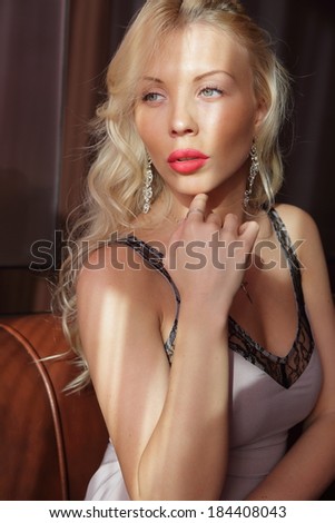 Portrait of a beautiful woman colored sundress