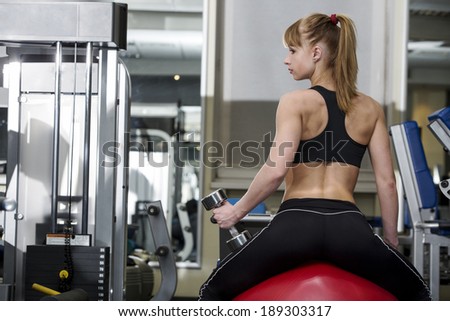 Sporty girl in the gym