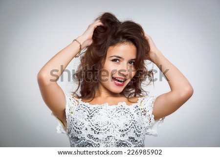 Portrait of sexy attractive brown-haired dress studio light background