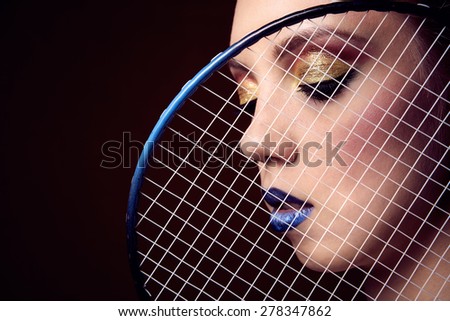 Girl with a tennis racket marked-up