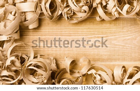 Large wood planer shavings background whit space for text