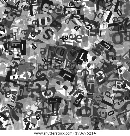 Designed black and white background of letters from newspaper clippings