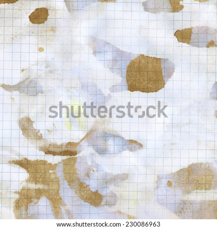 Paper background - coffee stains on sheet of graph paper