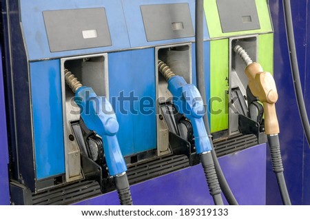 Four petrol pumps, close up, Fuel