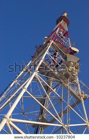 multi antenna communications tower with tv, radio, cellphones, telephones microwave data links etc