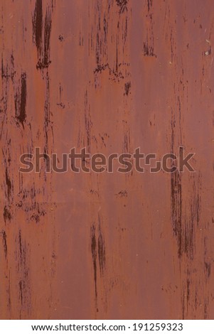 red terracotta textured wall with crack  in the sun