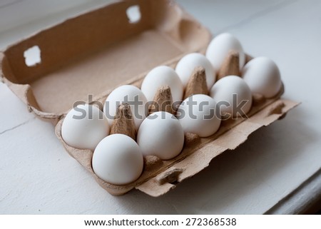 Paper Tray with white Eggs on white background