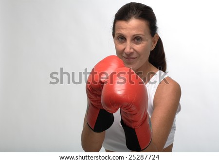 Mature Woman Wearing Boxing Gloves On Guard Stock Photo 25287724