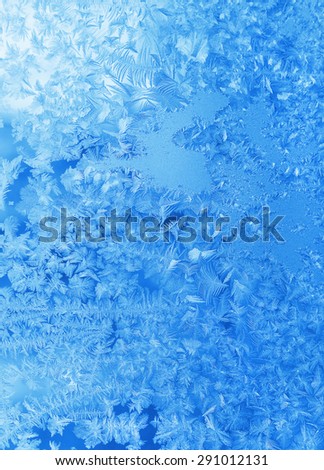 Texture of beautiful natural ice pattern on winter glass