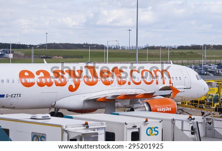London Luton, England â?? April 7, 2014: A Easyjet airplane parked at the Luton Airport in London, England, UK