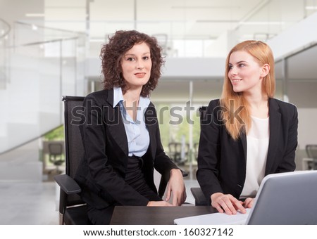 Two businesswoman in office