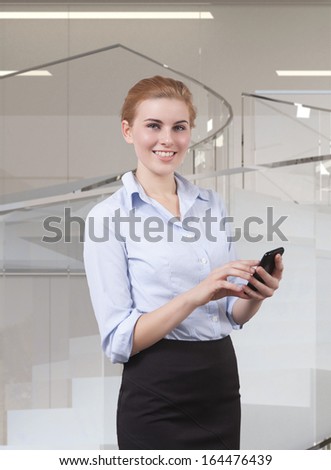 woman using cellphone for writing email