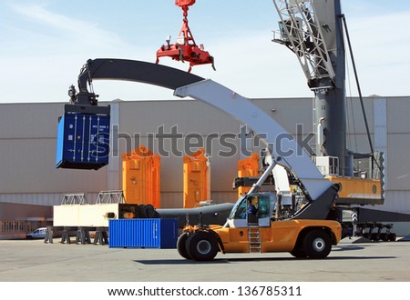 Container loader - reach stacker in the test area of Liebherr crane building factory, Rostock, Germany.