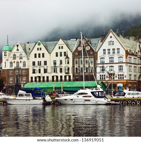 BERGEN, NORWAY: Old commercial buildings in waterfront Bryggen in Bergen. Bryggen is entered in the UNESCO list for World Cultural Heritage sites.
