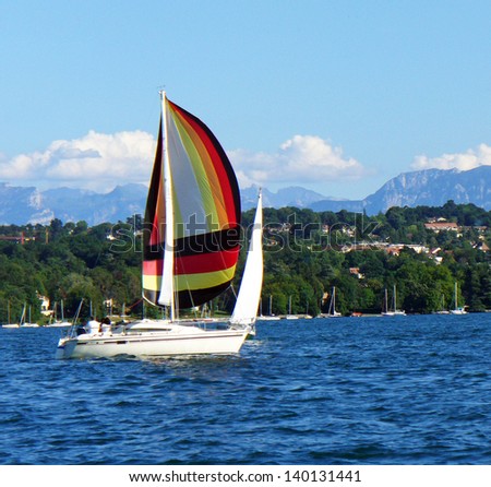 GENEVA, Switzerland: Yacht under sail in Geneva lake, Switzerland. Geneva lake is a biggest lake in Switzerland.