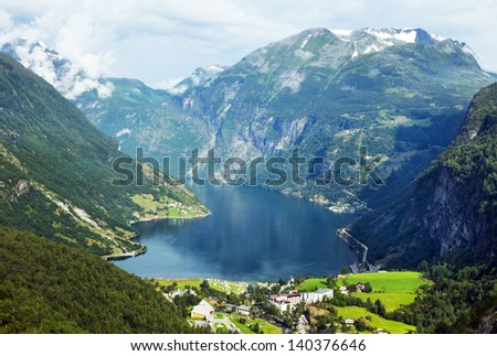 Cruise, Norway, Geiranger: mountains and rural houses in Geirangerfjord, Norway.