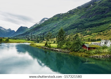 Country houses in village Olden in Norwegian fjords.