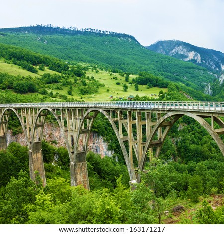 Bridge Construction. Durdevica Tara Arc Bridge In The Mountains, North Of Montenegro. One Of The Highest Automobile Bridges In Europe.