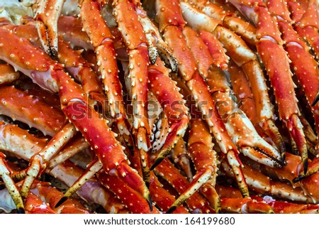 Meat of king crabs close up in fish market, Bergen, Norway