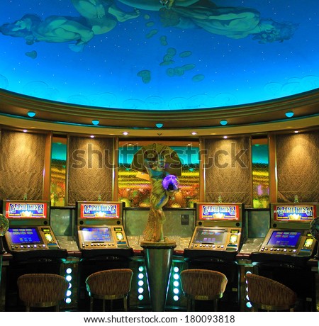 Gaming slot machines in American gambling casino in the cruise liner Vision of the Seas of Royal Caribbean International, USA.
