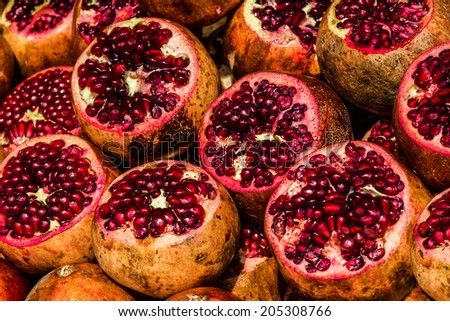 Juicy pomegranates background
