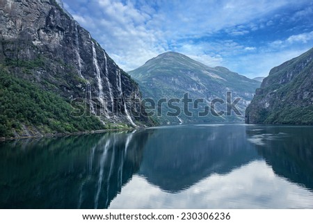 Geiranger fjord, Norway: landscape with mountains and waterfalls Seven Sisters.