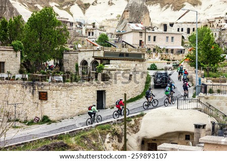 Bicycles riders, Goreme cave town, Cappadocia, Turkey.