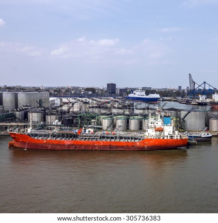 Cargo vessel in sea port Rotterdam, Netherlands.