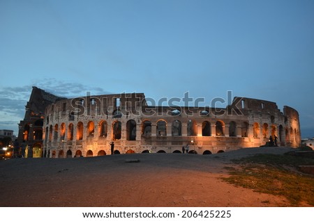 ROME, ITALY, MAY 30, 2014: People are gathering on a hill next to colloseum in order to take night pictures.
