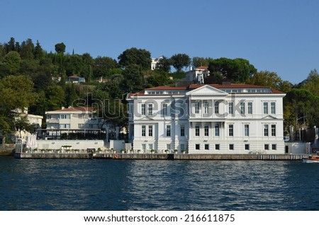 ISTANBUL, TURKEY, AUGUST 22, 2014: Cruise ferry is passing nice neighborhood of istanbul on the return journey of bosporus cruise.