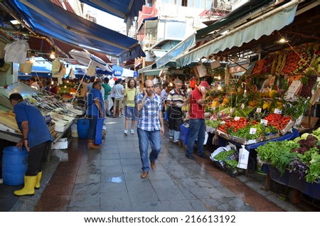 ISTANBUL, TURKEY, AUGUST 21, 2014: Ordinary streets of asian part of istanbul are during the day swiftly changed into marketplace with various items to buy.