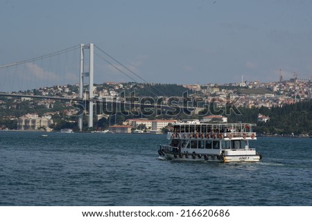 ISTANBUL, TURKEY, AUGUST 22, 2014: ferry is heading towards bosporus bridge in istanbul