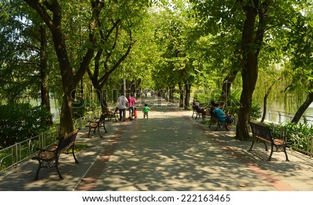 GUANGZHOU, CHINA, OCTOBER 2, 2013: People are enjoying sunny afternoon in park in guangzhou.