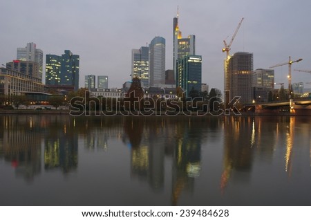 FRANKFURT, GERMANY, NOVEMBER 14, 2014: Skyline of skyscrapers in frankfurt is being reflected on the surface of main river.