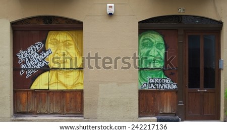 PAMPLONA, SPAIN, OCTOBER 25, 2014: local artists protest against social inequalities by their works in streets of pamplona.